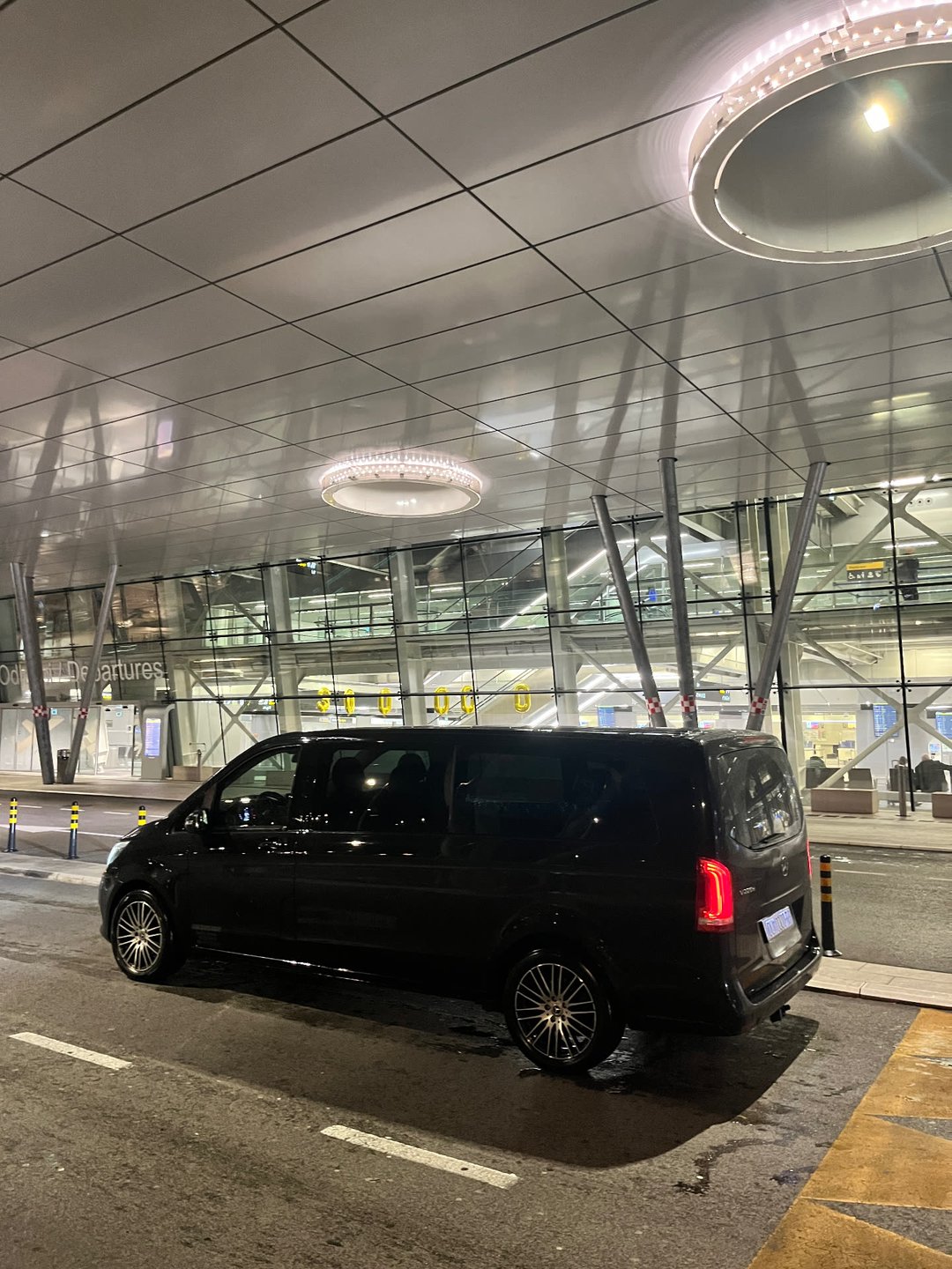 Mercedes-Benz V-Class at airport departures at night